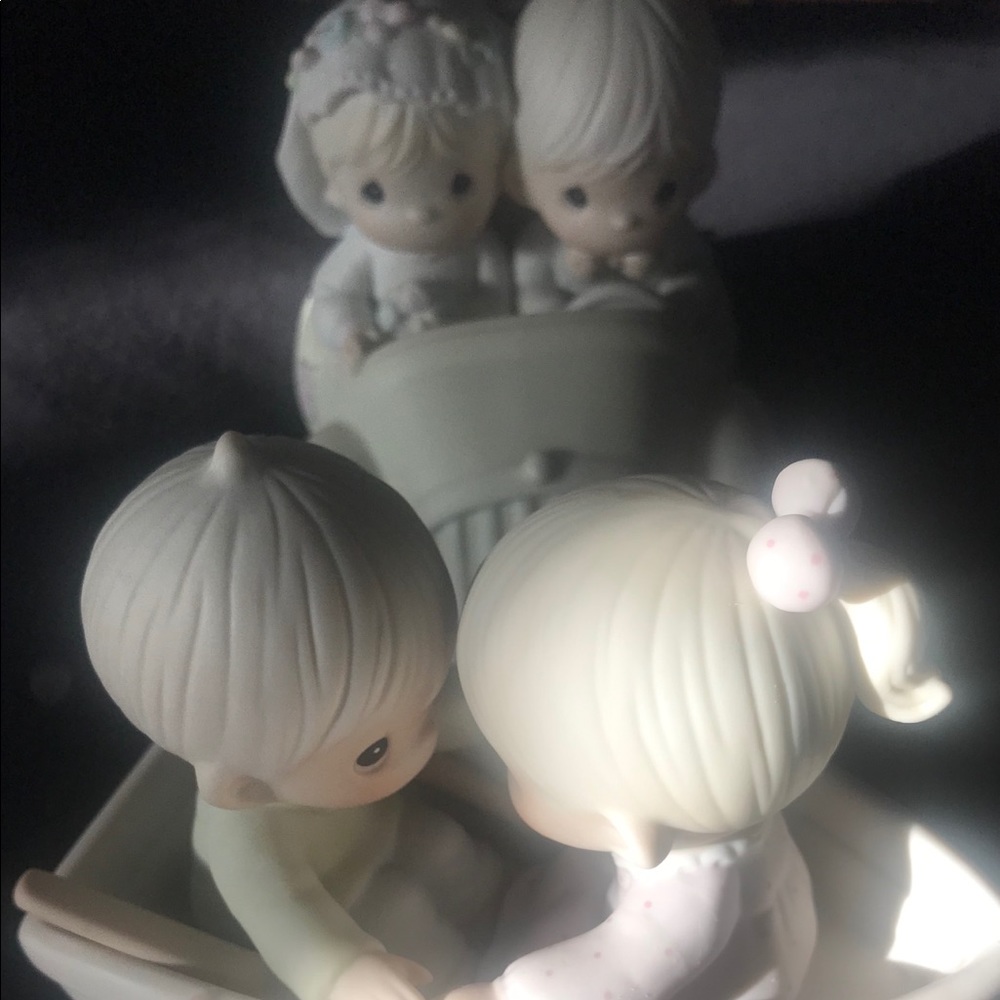 Precious Moments: couple in boat and couple in car